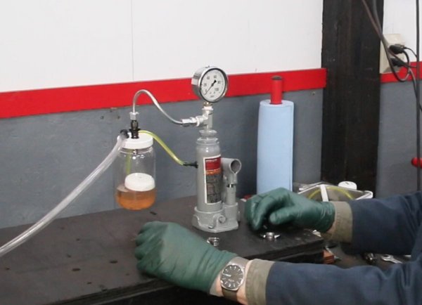 How to Fill a Fuel Injector Cleaner and Tester with Fluid 